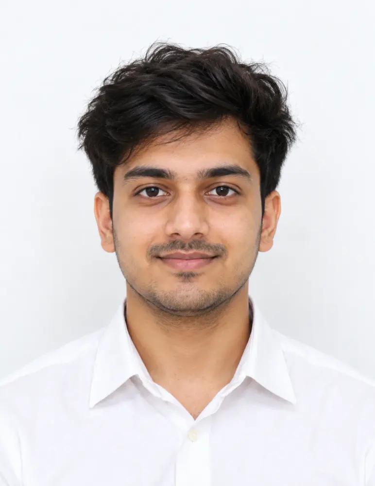 Passport Size Portrait AI Photo Prompt showing an Indian man in a white collared shirt, facing the camera against a plain light background with even studio lighting.